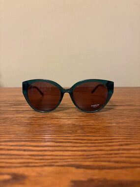 Bebe Teal Cat-Eye Sunglasses with Dark Lenses BB7243